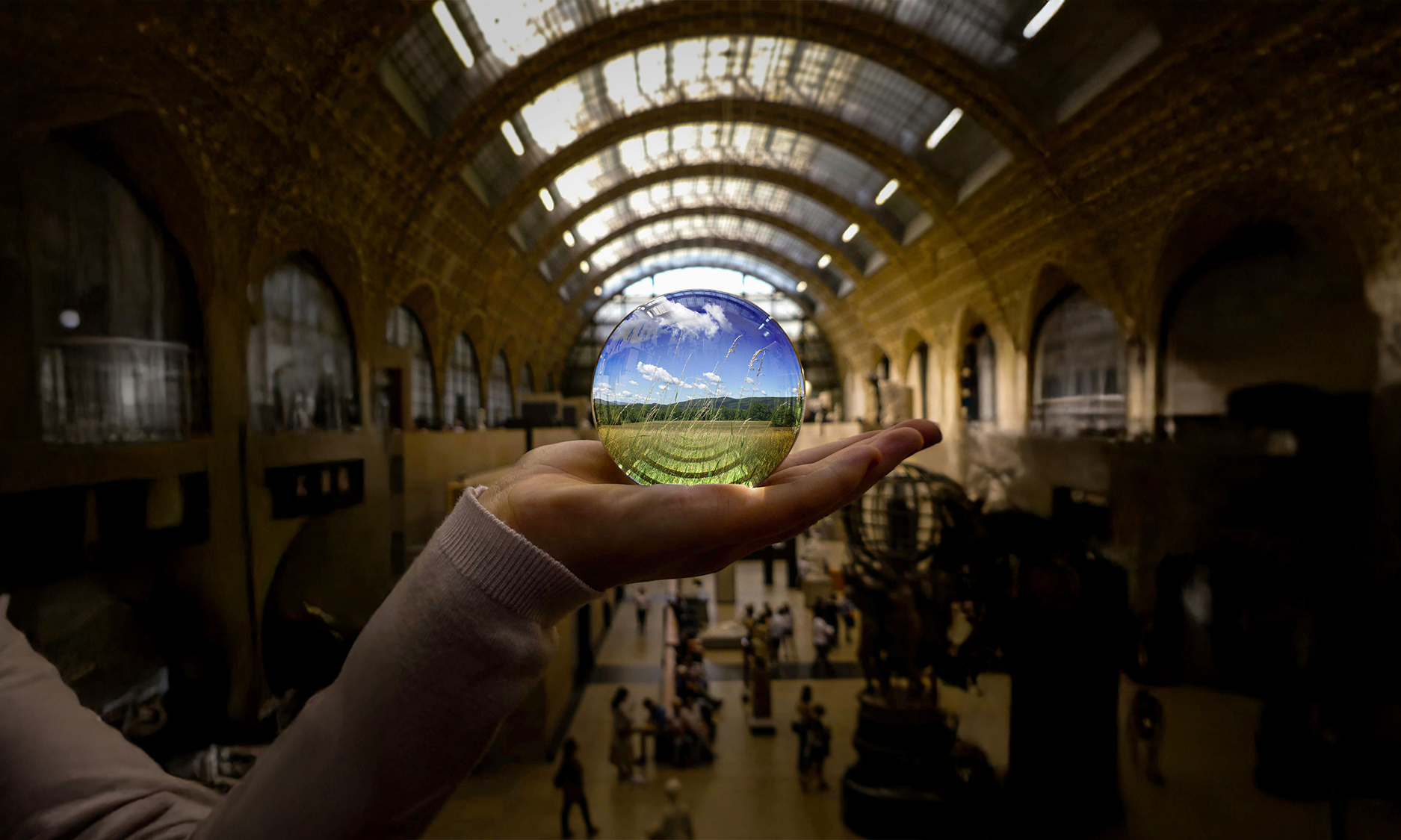 A globe in the middle of a hand