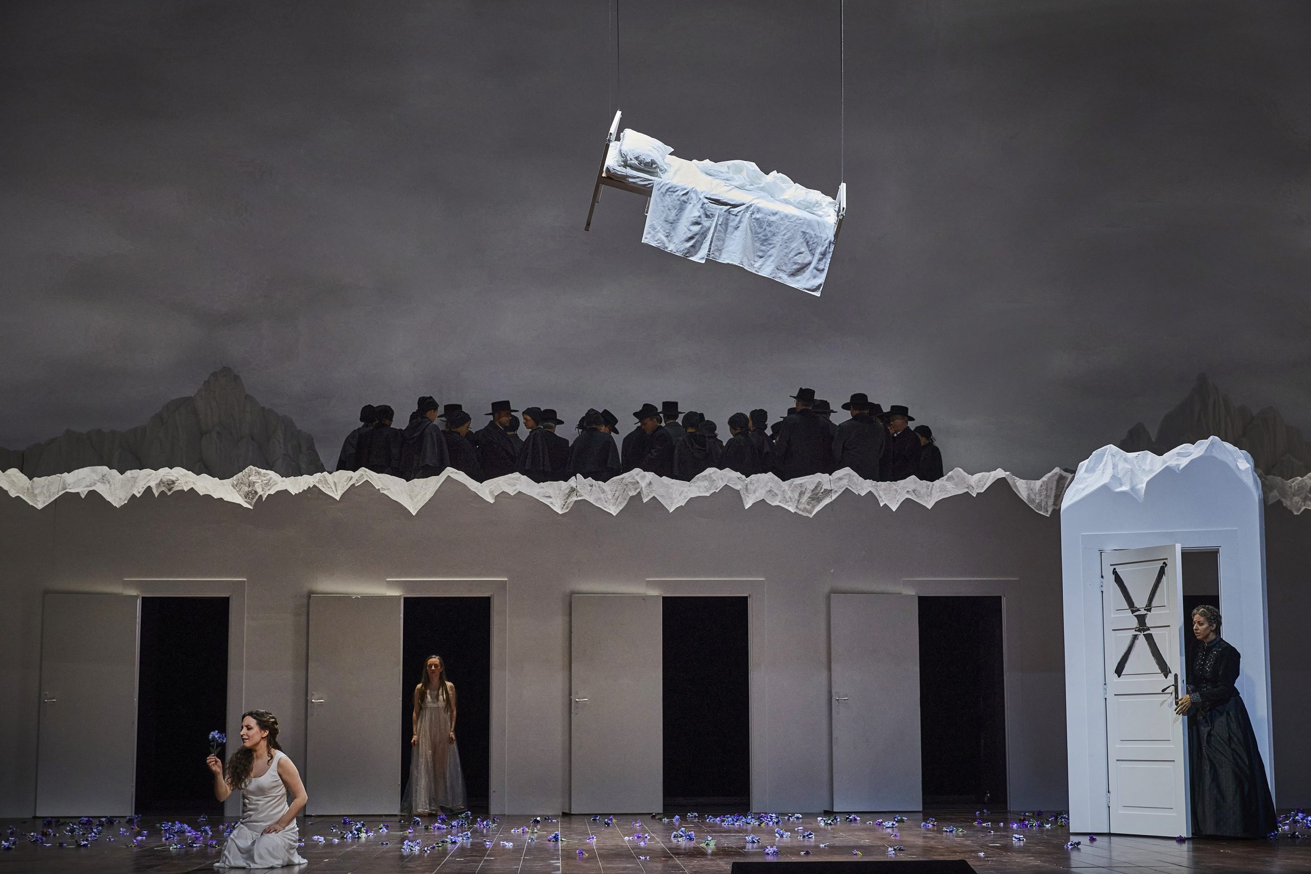 Still shot of singers performing a scene from "La Sonnambula"