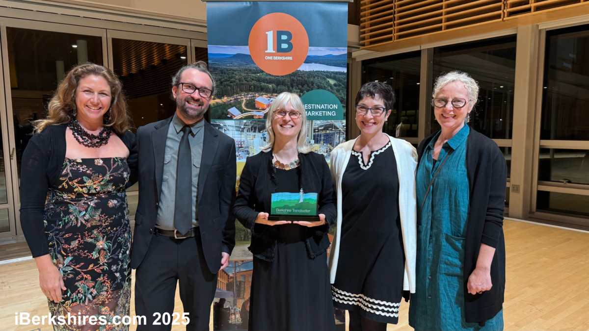 Mahaiwe staff members posing with an award