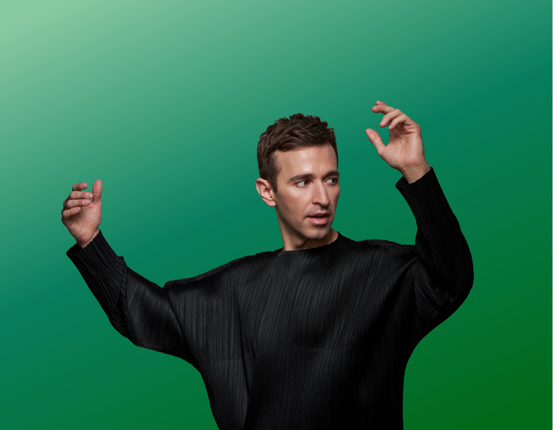 Opera singer Anthony Roth Costanzo in a conductor's pose