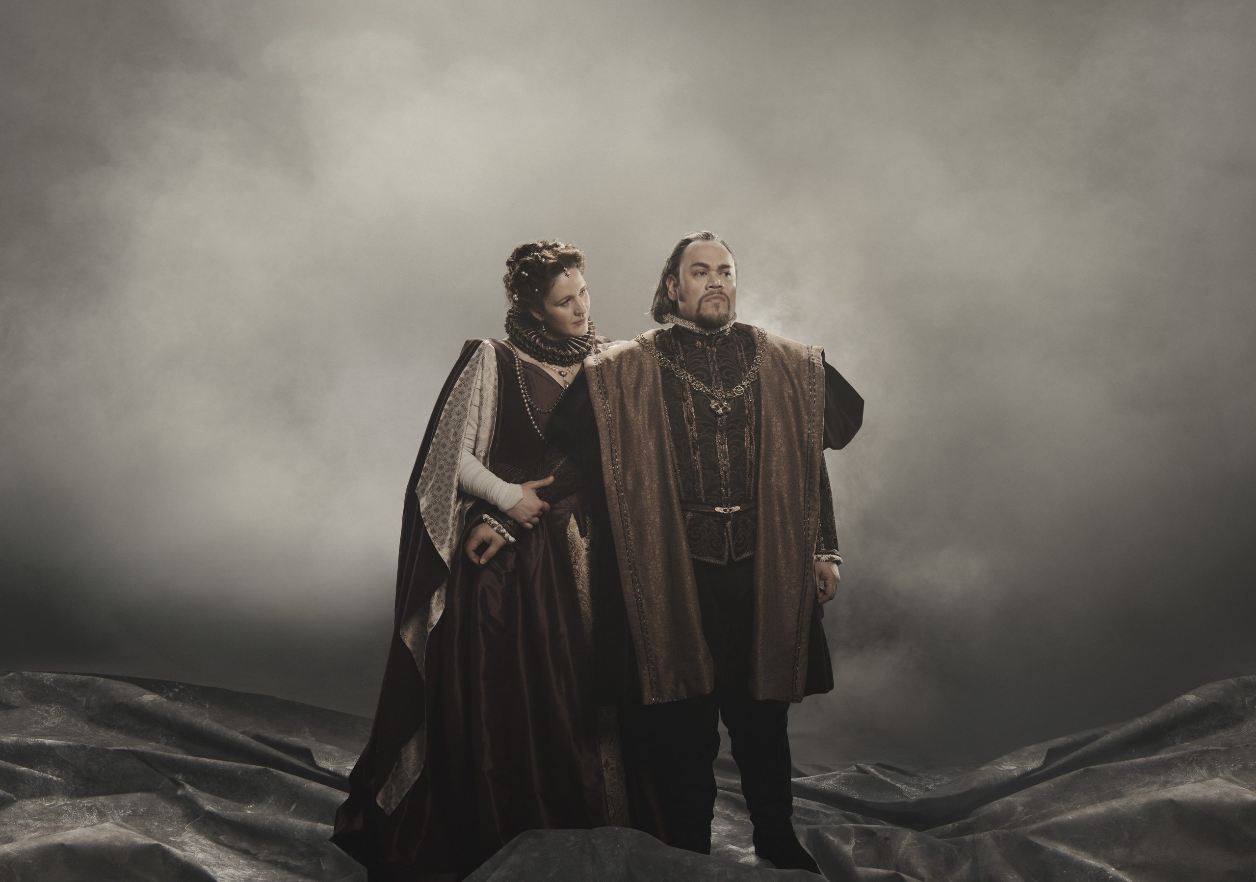 Two actors posing for the play Macbeth